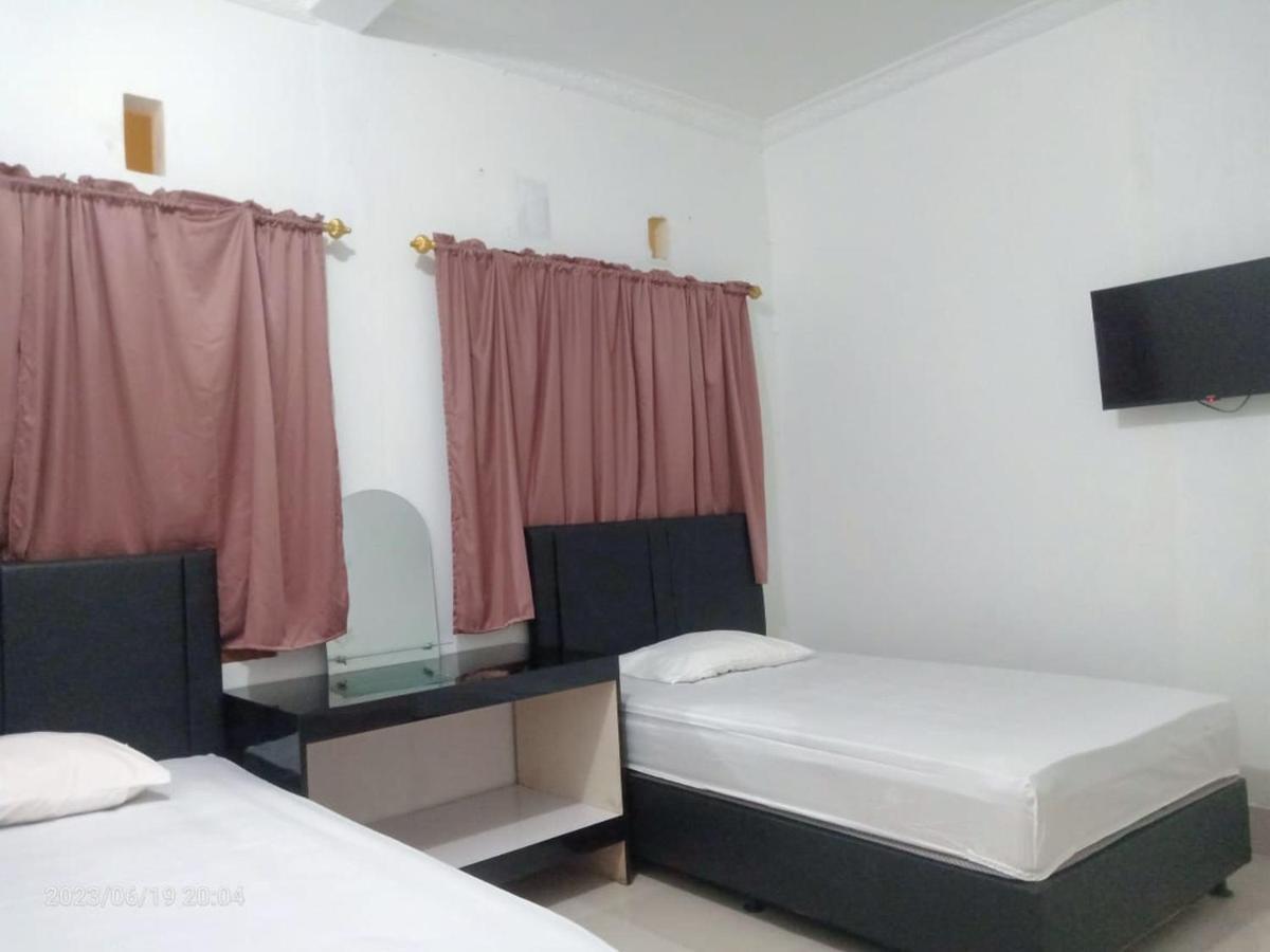 Permata Homestay Kotamobagu Mitra Reddoorz Exteriör bild